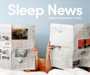 Two people reading newspapers in bed. Text reads: Sleep News Week of September 9, 2022.