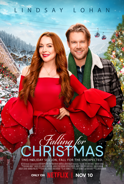Lindsay Lohan and Chord Overstreet smiling in front if a winter Christmas Scene