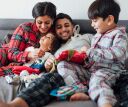 A family relaxing and enjoying the holiday season after a good night's rest