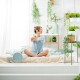 Woman doing the 54321 sensory grounding technique for relaxing sleep.