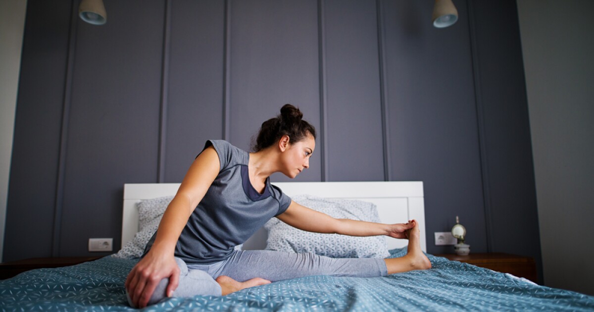 15-Minute Bed Yoga Routine to Help You Sleep | Sleep.com