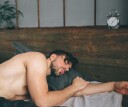 Man sleeping naked in bed