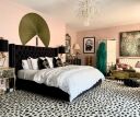 Decor in a Hollywood Regency inspired bedroom.