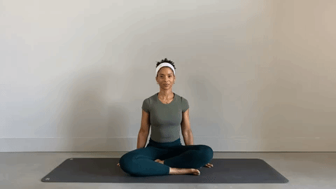 Alexa Idama practicing Pilates head side to side